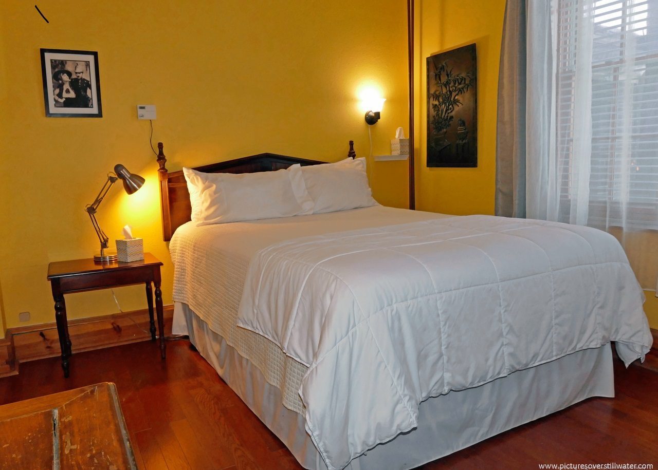 Charlie Chaplin room with queen bed.