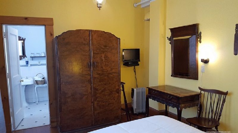 Charlie Chaplin room - armoire and bathroom doorway